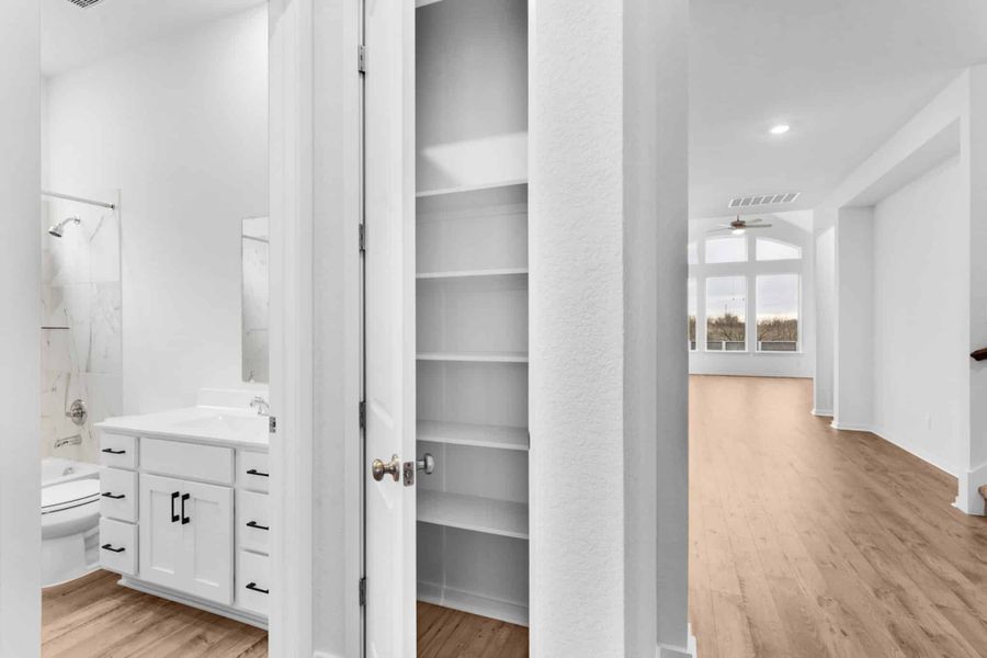 Furnished interior view inside a new home in Carillon, Manor (Image 11).