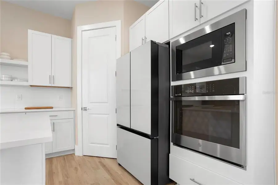 Furnished interior view inside a new home in , Winter Garden (Image 10).