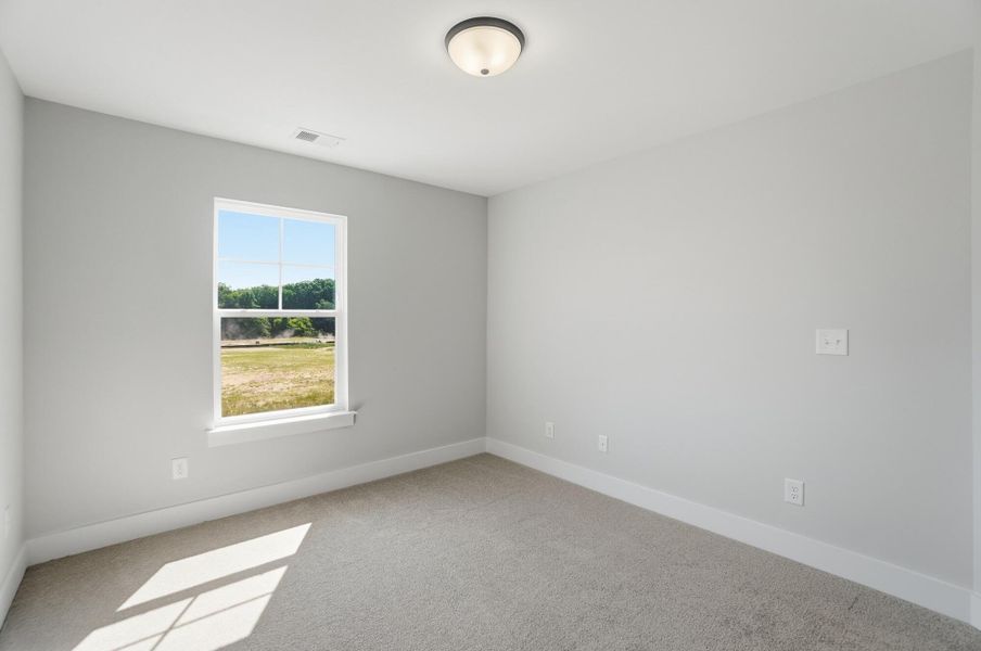 Spacious, unfurnished interior of a new home in Blythe Mill Townhomes, Waxhaw (Image 24).