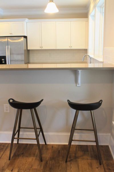 Furnished interior view inside a new home in Weybridge, Burlington (Image 11).