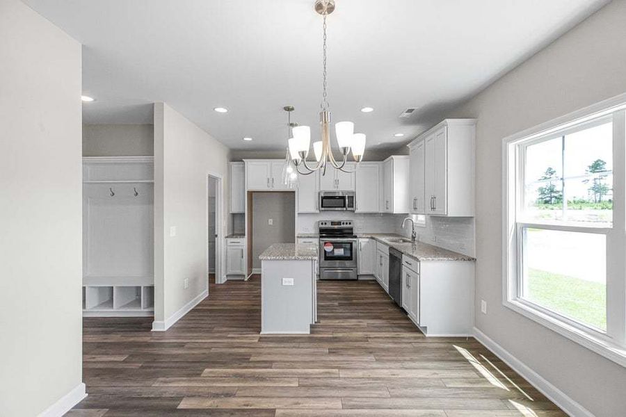 Representative furnished interior of a home built from the Magnolia by Caviness & Cates Communities in Bartlett Manor, Youngsville (Image 33).