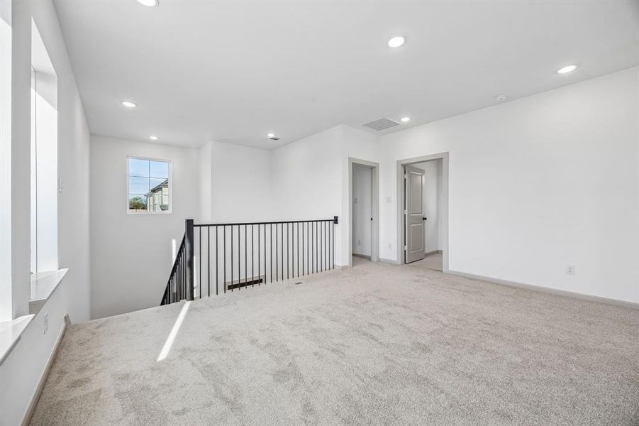 The entire family will enjoy hours of fun time in this spacious, light filled game room!