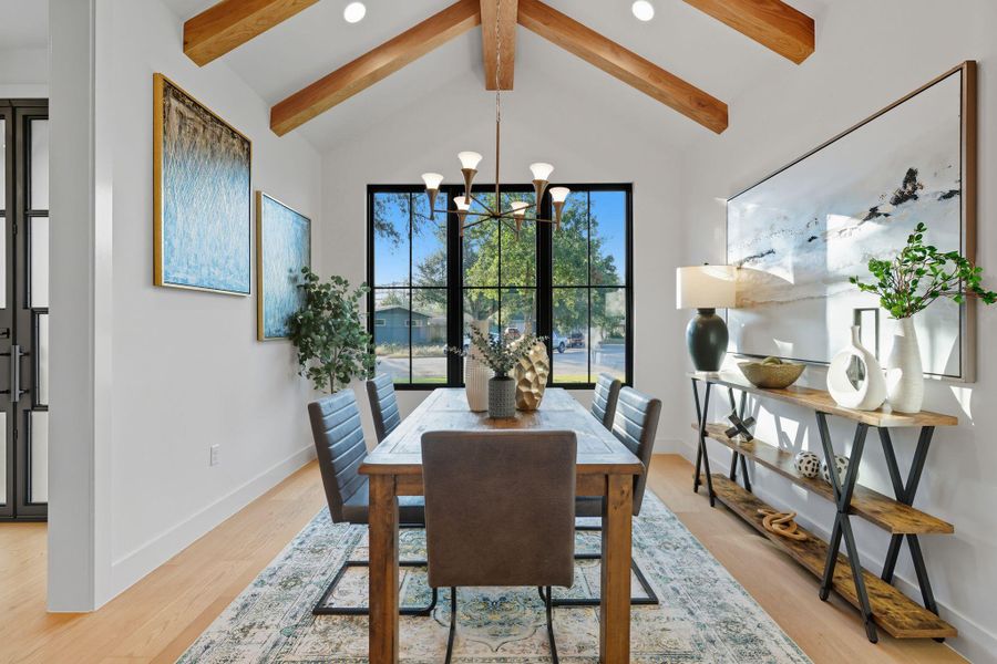 Dining room featuring light wood-style flooring, a chandelier, and recessed lighting Dining room featuring light wood-style flooring, a chandelier, and recessed lighting