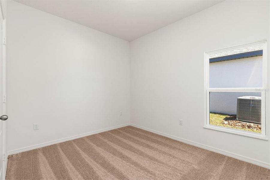 Spacious, unfurnished interior of a new home in Peach Crossings, Winter Haven (Image 14).