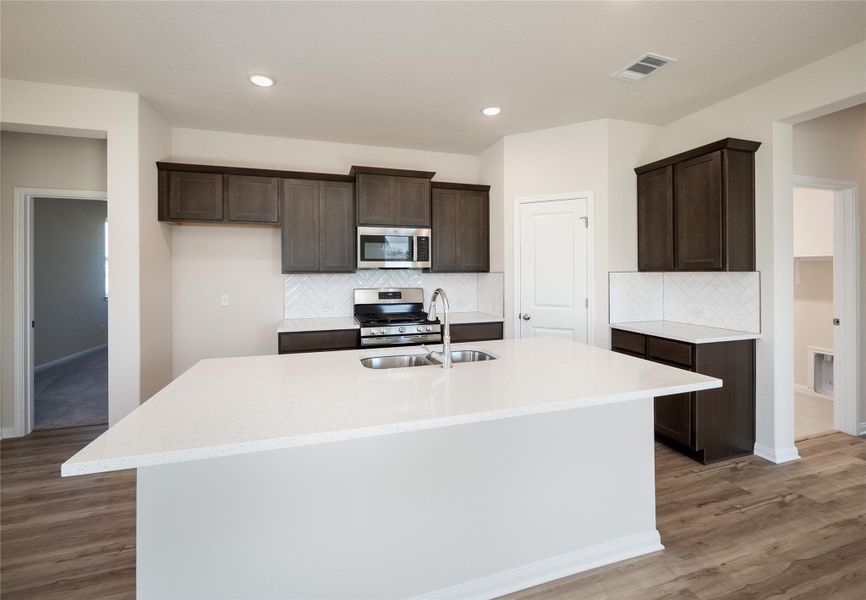 Furnished interior view inside a new home in Anthem Cottages, Kyle (Image 10).