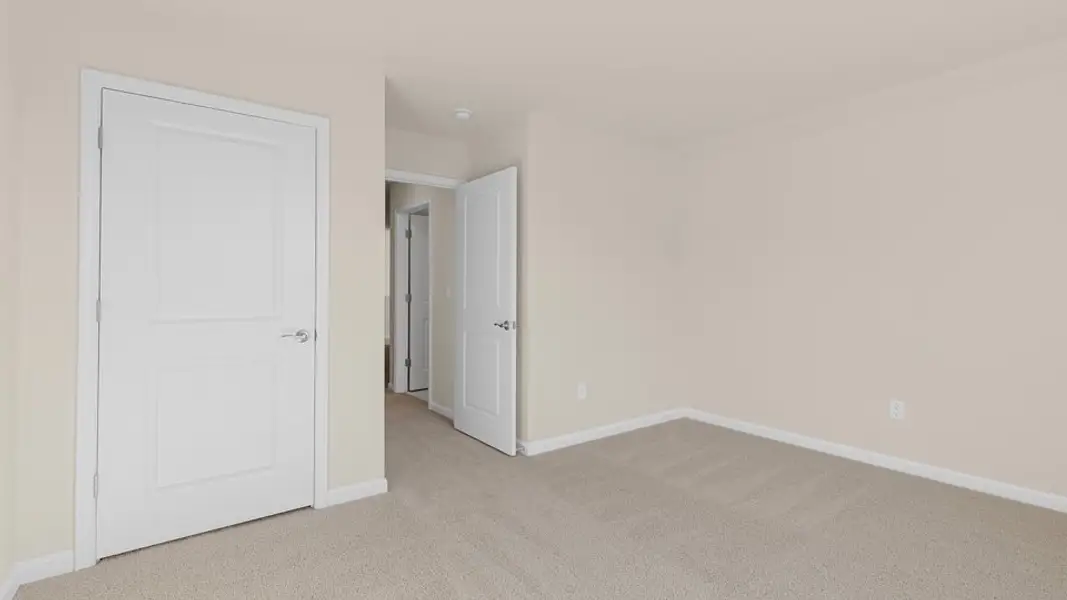 Spacious, unfurnished interior of a new home in The Villas at Galvins Ridge, Sanford (Image 22).