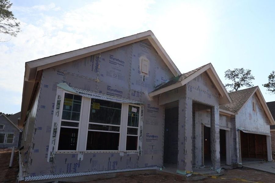 Front exterior of a new home in ARTAVIA 65' Homesites, Conroe, TX, highlighting curb appeal (Image 2). Front exterior of a new home in ARTAVIA 65' Homesites, Conroe, TX, highlighting curb appeal (Image 2).