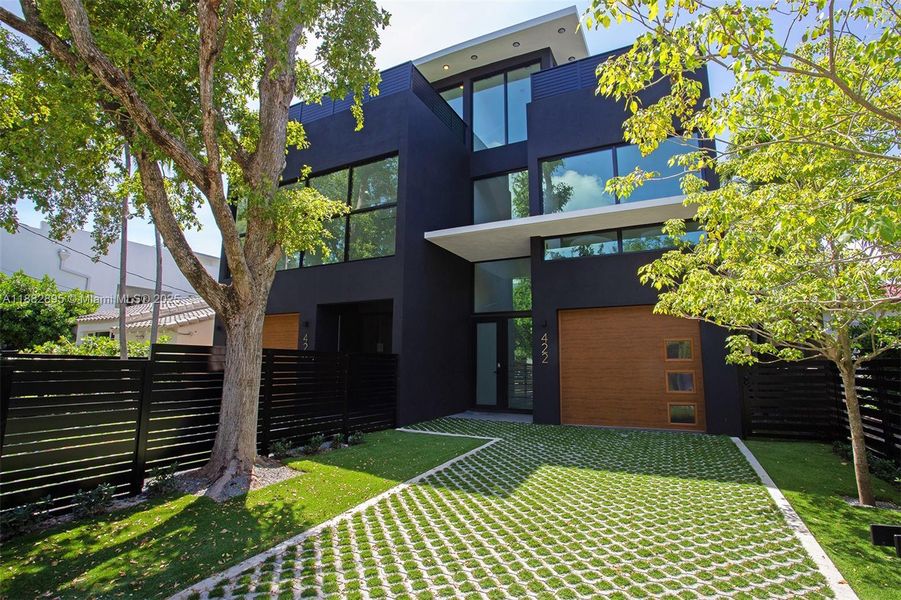 Front exterior of a new home in , Miami, FL, highlighting curb appeal (Image 23).