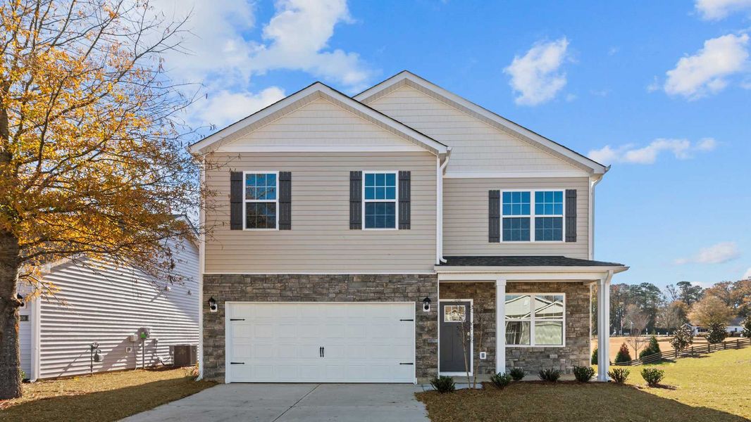 Representative exterior photo of a completed home built from the Belhaven by D.R. Horton in Tyler - Home on the Lake, New Bern, NC (Image 11). Representative exterior photo of a completed home built from the Belhaven by D.R. Horton in Tyler - Home on the Lake, New Bern, NC (Image 11).