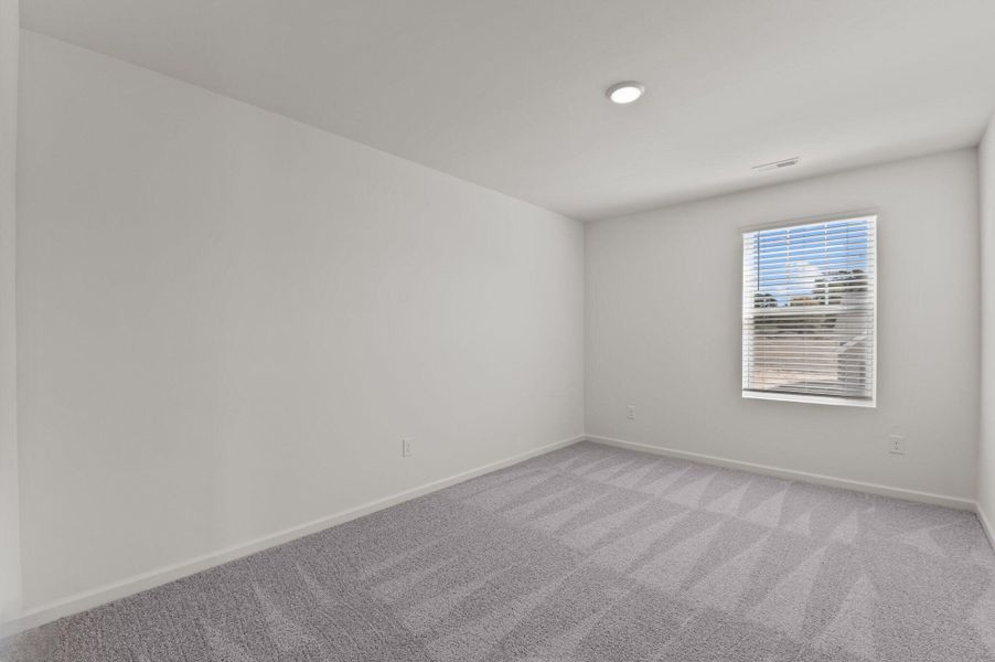 Representative unfurnished interior of a home built from the Solstice by Starlight Homes in Noble Ridge, Howe (Image 27).
