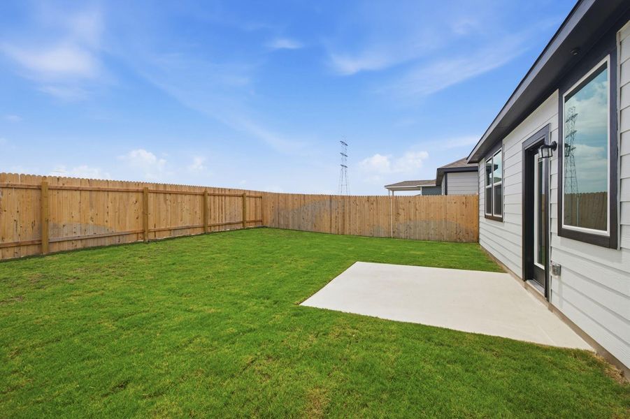 Exterior details and patio area of a home in Stallion Run, Buda (Image 29).