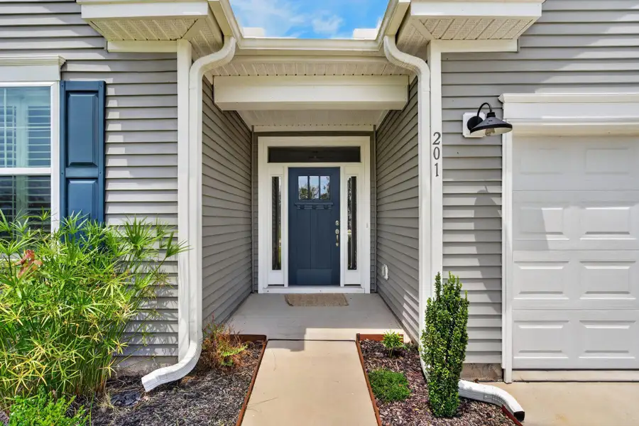 Exterior details and patio area of a home in , Ridgeville (Image 30).