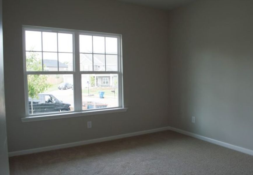 Representative unfurnished interior of a home built from the Poplar by Piedmont Residential in Falls Creek, Flowery Branch (Image 18).