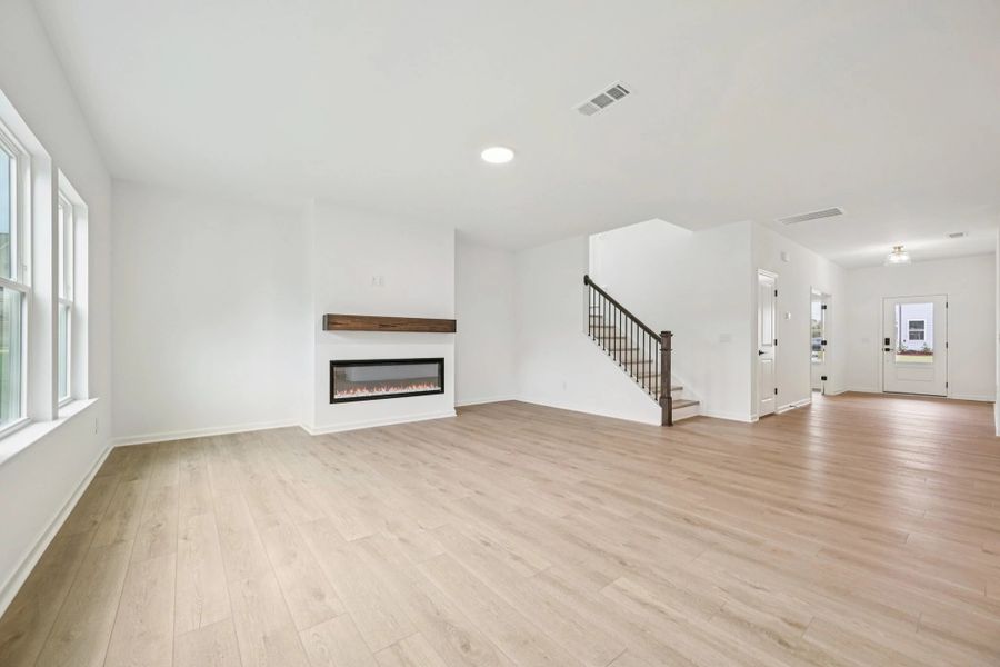 Family Room featuring the AW Collection® Serene - Open space with natural finishes and light.