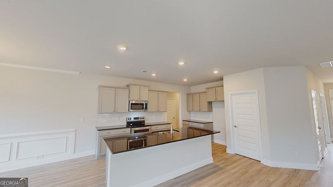 Furnished interior view inside a new home in Holliday Pass, Griffin (Image 5).