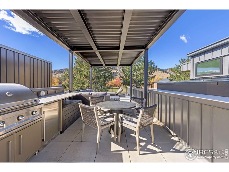 Upgrade options for rooftop deck include full kitchen and pergola.