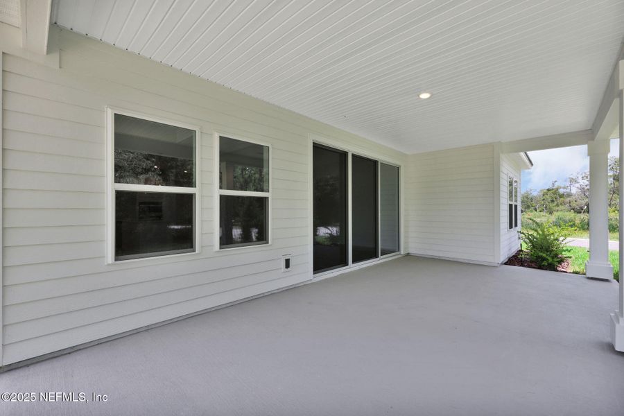 Exterior details and patio area of a home in Creighton Pointe, Fleming Island (Image 24).