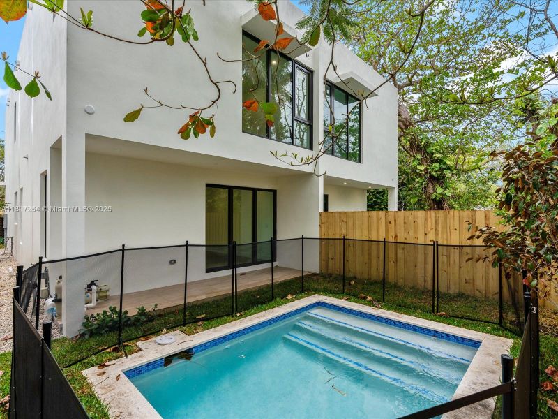 Exterior details and patio area of a home in , Miami (Image 3).