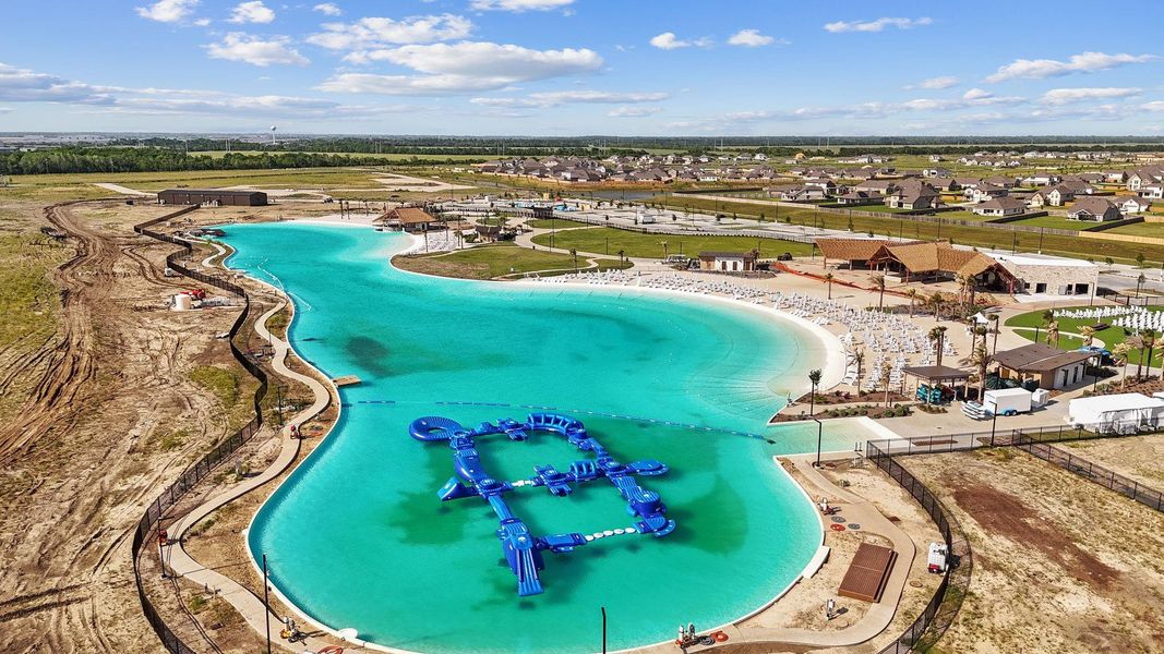 Welcome to the resort-style living of River Ranch Meadows! This aerial view of the breathtaking Crystal Lagoon shows just how extraordinary this community is—perfect for swimming, paddleboarding, or soaking up the sun in your very own backyard paradise. Welcome to the resort-style living of River Ranch Meadows! This aerial view of the breathtaking Crystal Lagoon shows just how extraordinary this community is—perfect for swimming, paddleboarding, or soaking up the sun in your very own backyard paradise.