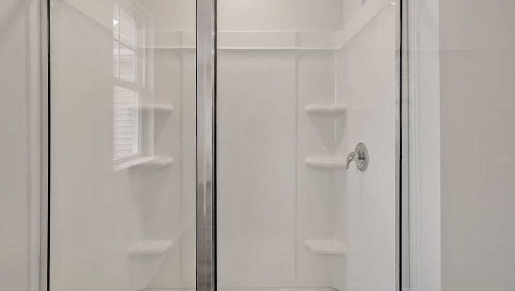Representative unfurnished interior of a home built from the GLYNN by D.R. Horton in Grayson Park, Leland (Image 27).