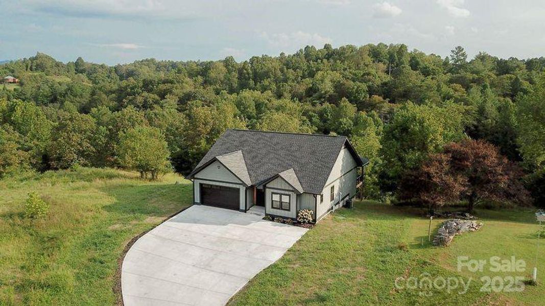 Front exterior of a new home in , Alexander, NC, highlighting curb appeal (Image 27). Front exterior of a new home in , Alexander, NC, highlighting curb appeal (Image 27).