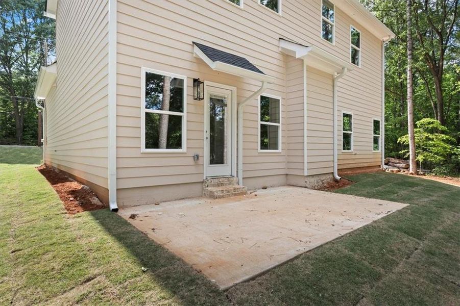 Front exterior of a new home in , Ellenwood, GA, highlighting curb appeal (Image 20).