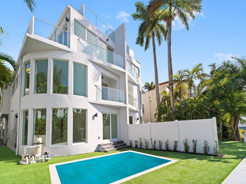 Front exterior of a new home in , Fort Lauderdale, FL, highlighting curb appeal (Image 1).