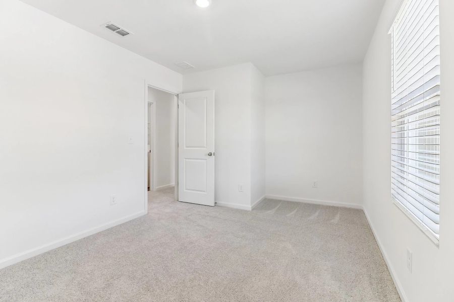Representative unfurnished interior of a home built from the Copernicus by Starlight Homes in Vida Mar, League City (Image 18). Representative unfurnished interior of a home built from the Copernicus by Starlight Homes in Vida Mar, League City (Image 18).