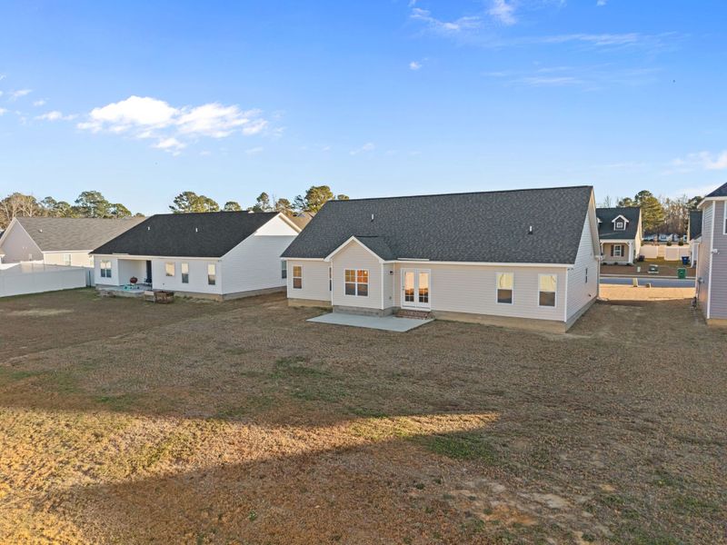 Exterior details and patio area of a home in Arbor Hills South II, Greenville (Image 26).