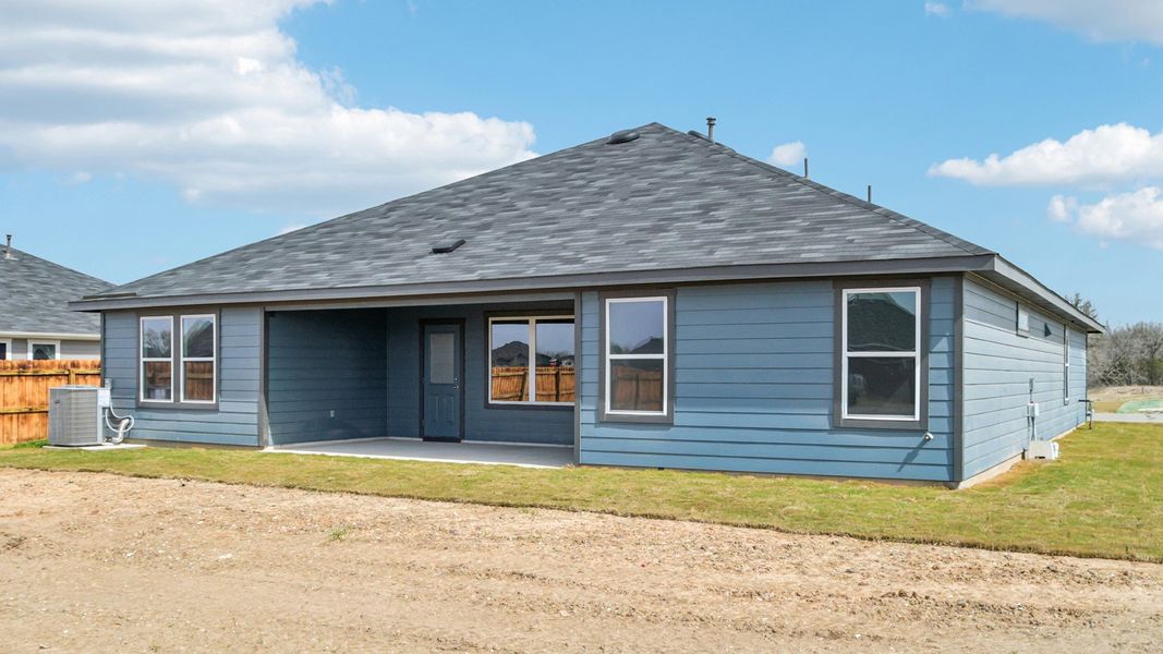 Exterior details and patio area of a home in Railhead, Cedar Creek (Image 17).