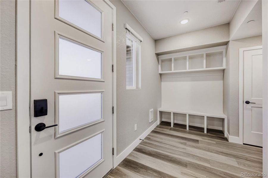 Upgraded cubbies and bench at owners entrance