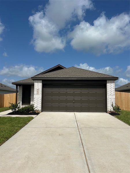 Front exterior of a new home in Valor Park, Bay City, TX, highlighting curb appeal (Image 22).