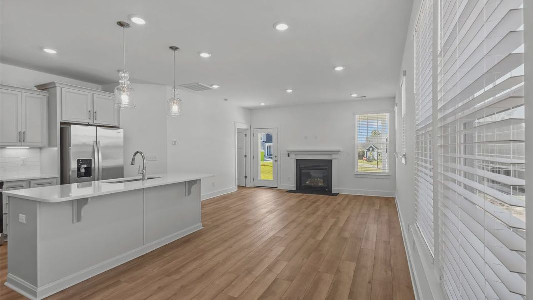 Representative furnished interior of a home built from the Freesia by DRB Homes in Harrier Point, Woodruff (Image 3).