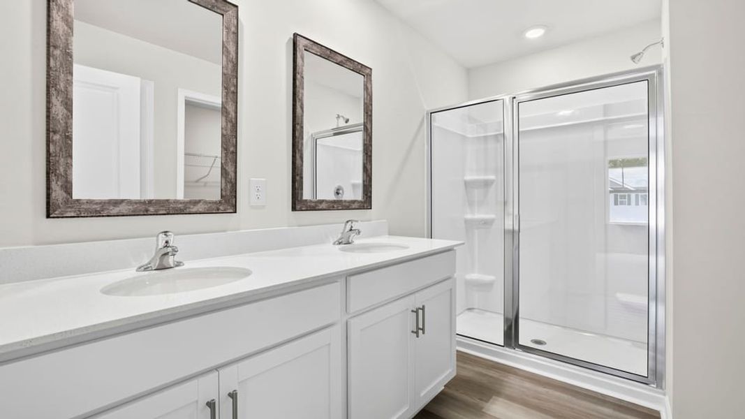 Furnished interior view inside a new home in Bentley Park, Greenwood (Image 13).