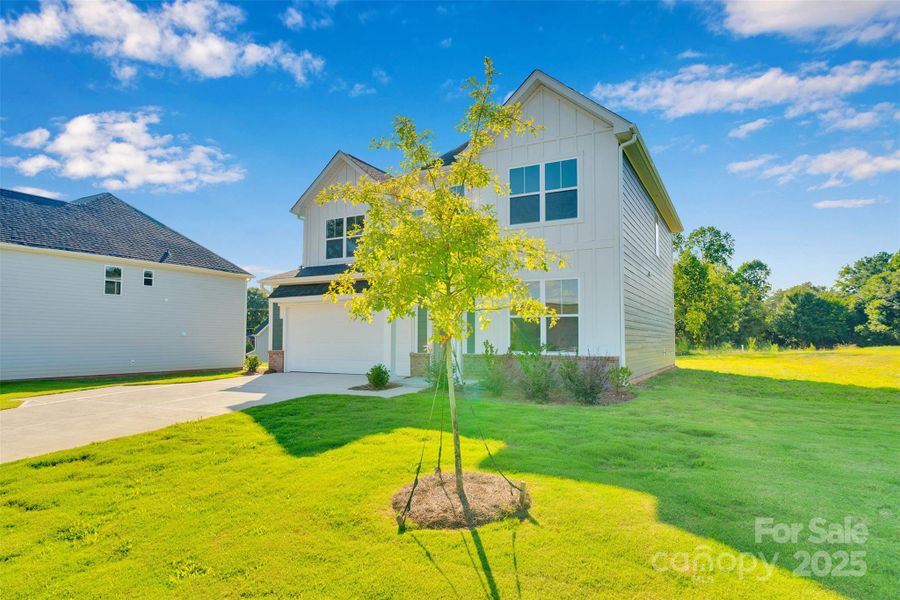 Front exterior of a new home in , Lincolnton, NC, highlighting curb appeal (Image 2).
