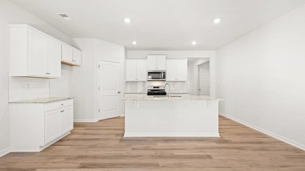 Furnished interior view inside a new home in South Wind, Fairburn (Image 7).