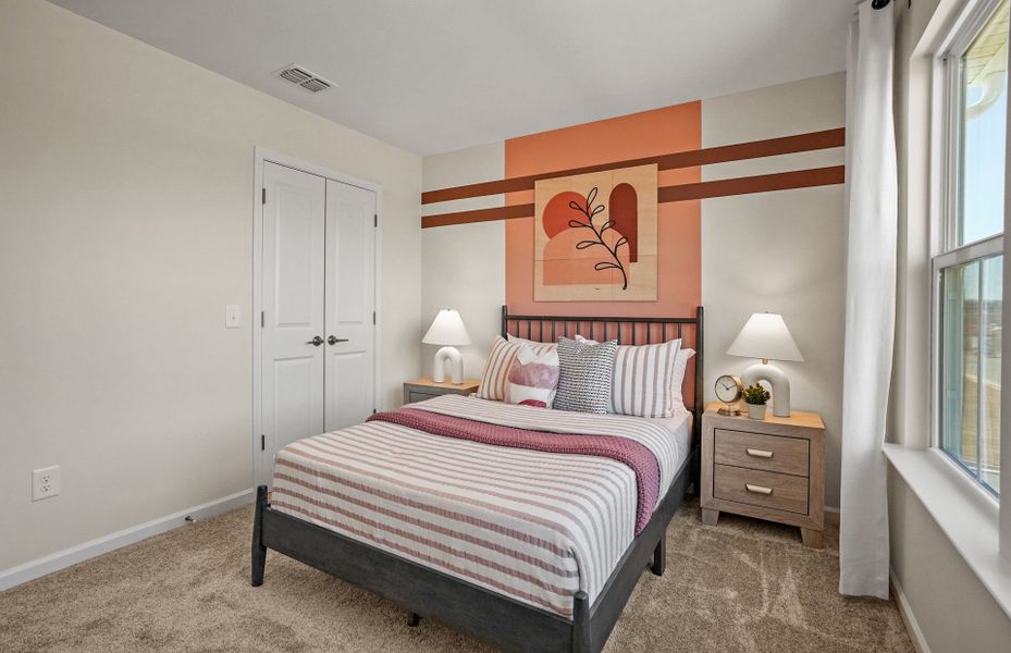 Representative furnished interior of a home built from the Badin by Pulte Homes in Riverstone, Monroe (Image 29).