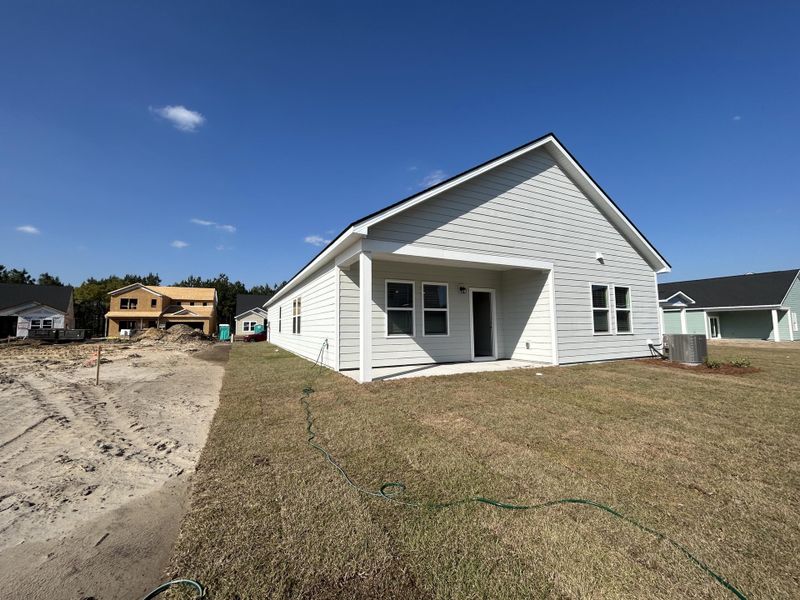 Exterior details and patio area of a home in , Ravenel (Image 3).