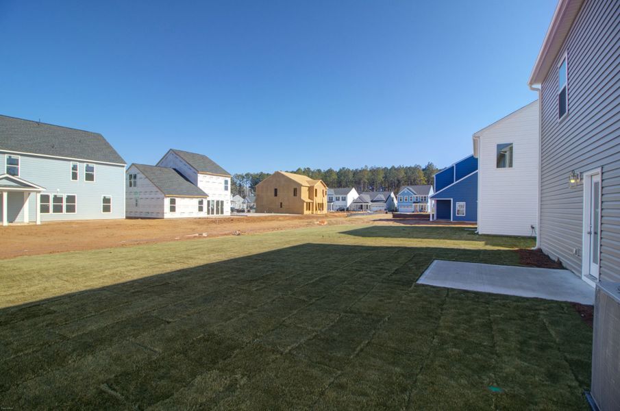 Exterior details and patio area of a home in Homecoming, Ravenel (Image 2).