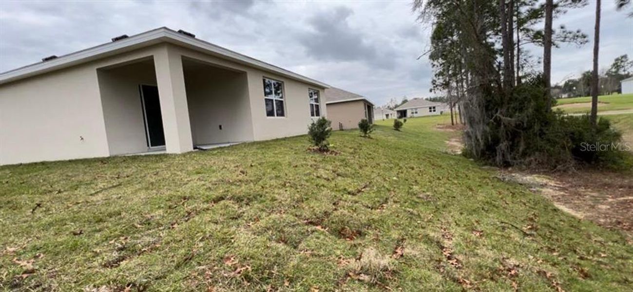 Front exterior of a new home in Lake Diamond, Ocala, FL, highlighting curb appeal (Image 7).