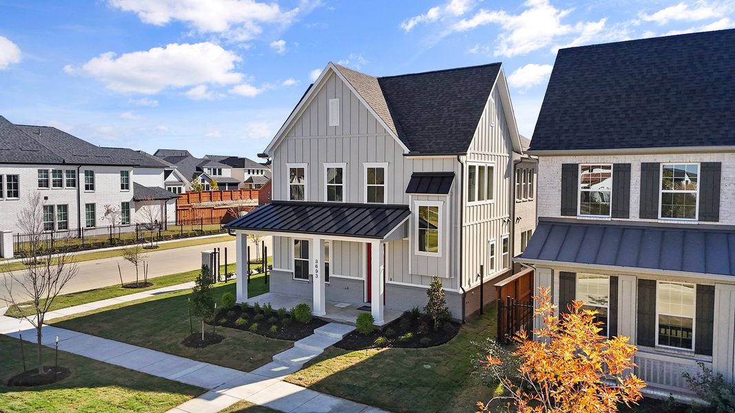 Front exterior of a new home in Fields - 40' Lots, Frisco, TX, highlighting curb appeal (Image 2). Front exterior of a new home in Fields - 40' Lots, Frisco, TX, highlighting curb appeal (Image 2).
