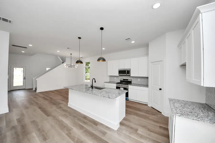 Furnished interior view inside a new home in , Huffman (Image 8).