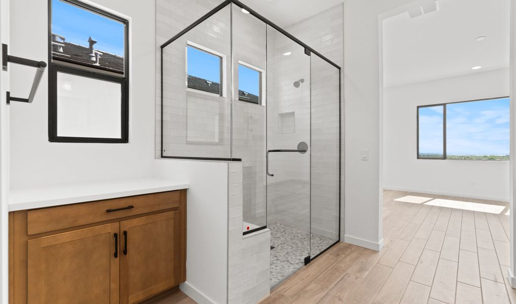 Primary bath with glass shower enclosure Primary bath with glass shower enclosure