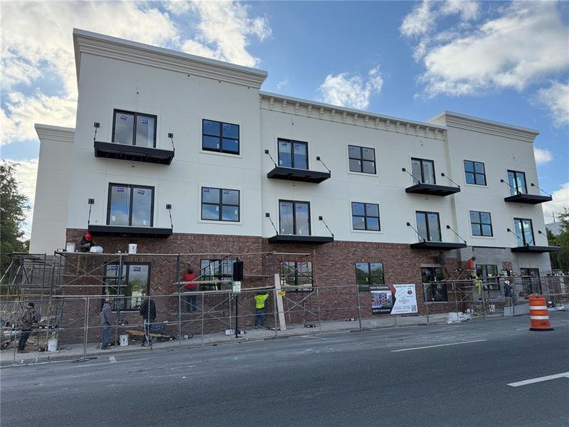 Front exterior of a new home in , Ocala, FL, highlighting curb appeal (Image 1).