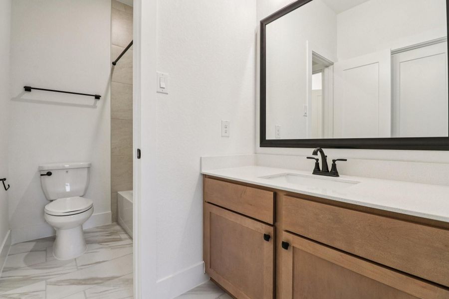 Furnished interior view inside a new home in The Highlands, Porter (Image 8).