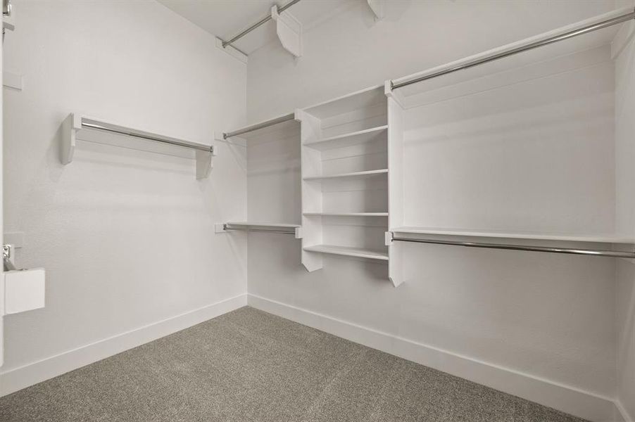 Featuring seasonal hanging space and tons of space, the closet of your dreams awaits!