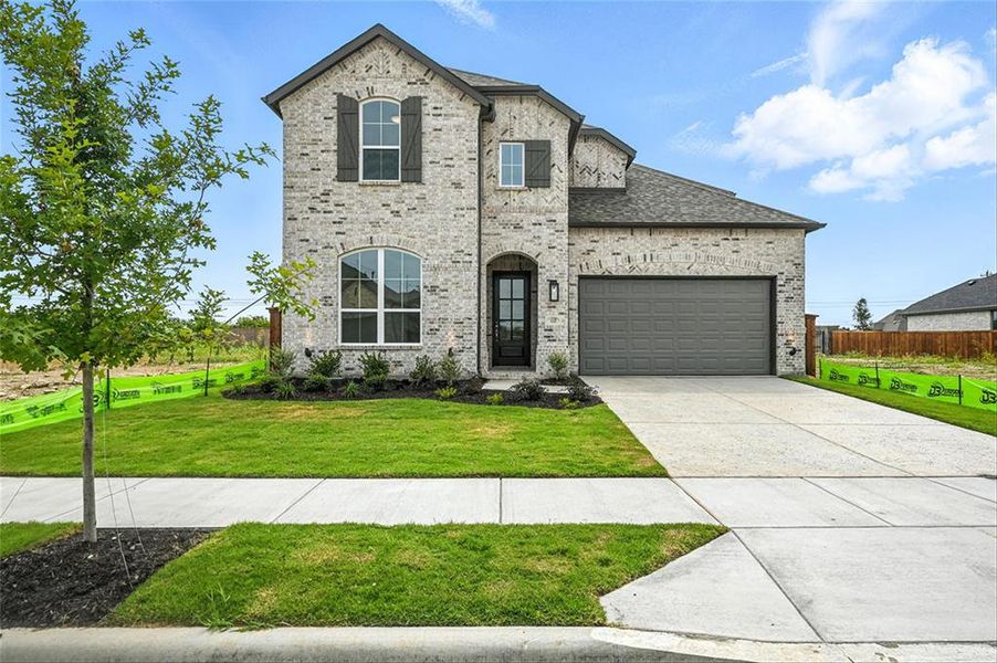 Front exterior of a new home in Wellington: Artisan Series - 50ft lots, Haslet, TX, highlighting curb appeal (Image 23). Front exterior of a new home in Wellington: Artisan Series - 50ft lots, Haslet, TX, highlighting curb appeal (Image 23).