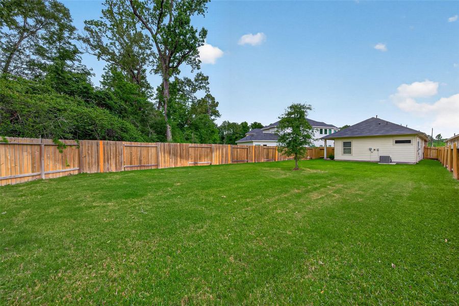 Exterior details and patio area of a home in , Huffman (Image 19).