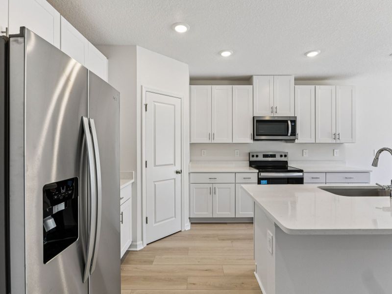 Furnished interior view inside a new home in Salt Meadows - Classic Series, Parrish (Image 4).