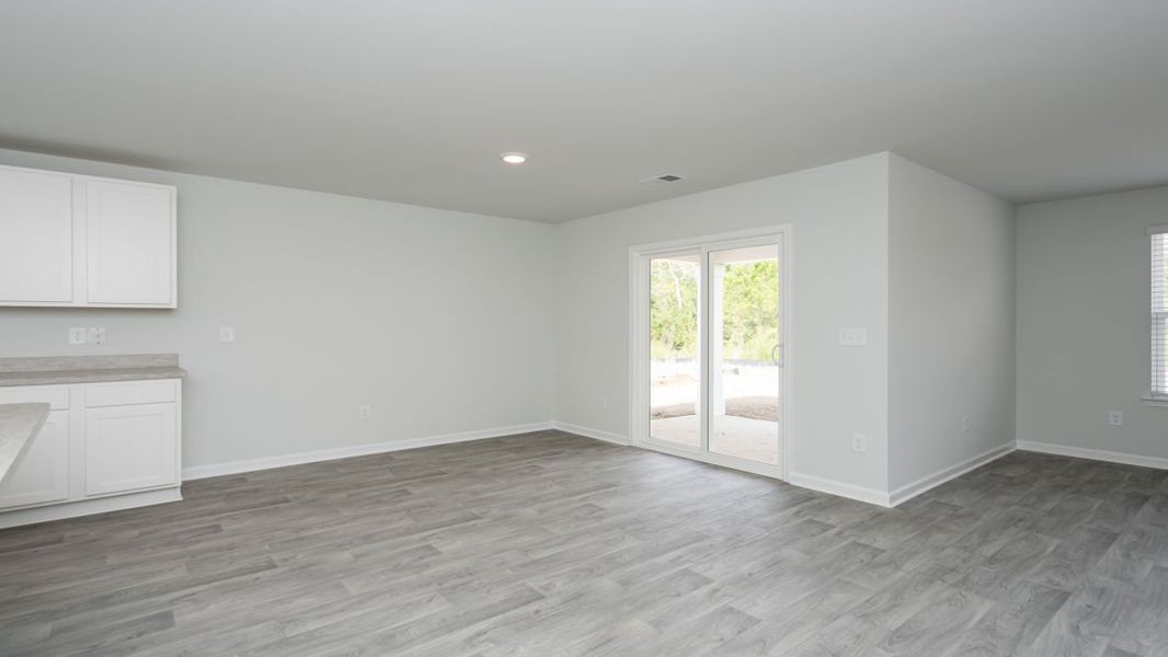 Representative unfurnished interior of a home built from the Cali by D.R. Horton in Jordanville Farms, Galivants Ferry (Image 26).